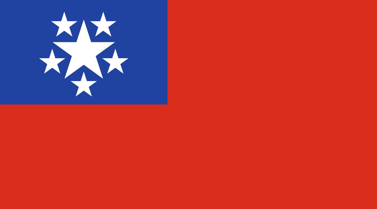 绿,红三色横条组成,国旗正中是一颗白色大五角星,覆盖三色横带并指向