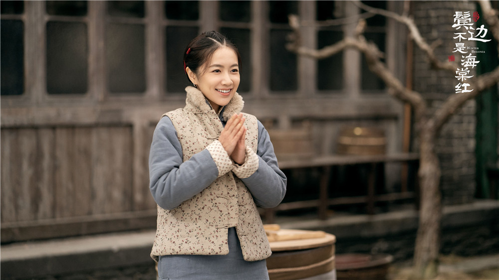 鬓边不是海棠红