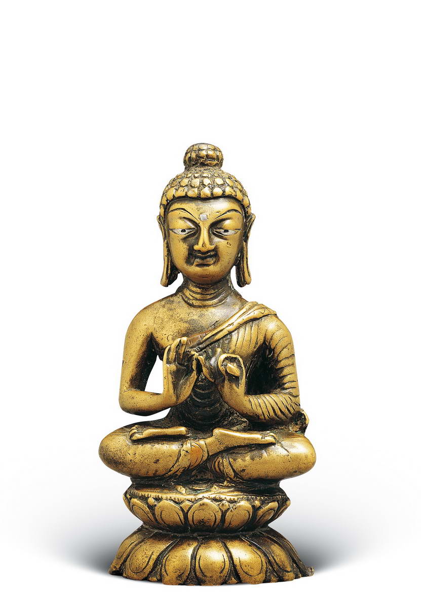 ">古格王国 /a>特有的一种制作佛像的工艺,用白银镶嵌铜像的眼睛,眸子