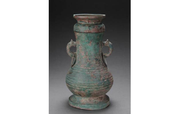  p>蟠螭纹铜圆壶是春秋时期的一件文物,1997年河南新郑郑韩故城中行六