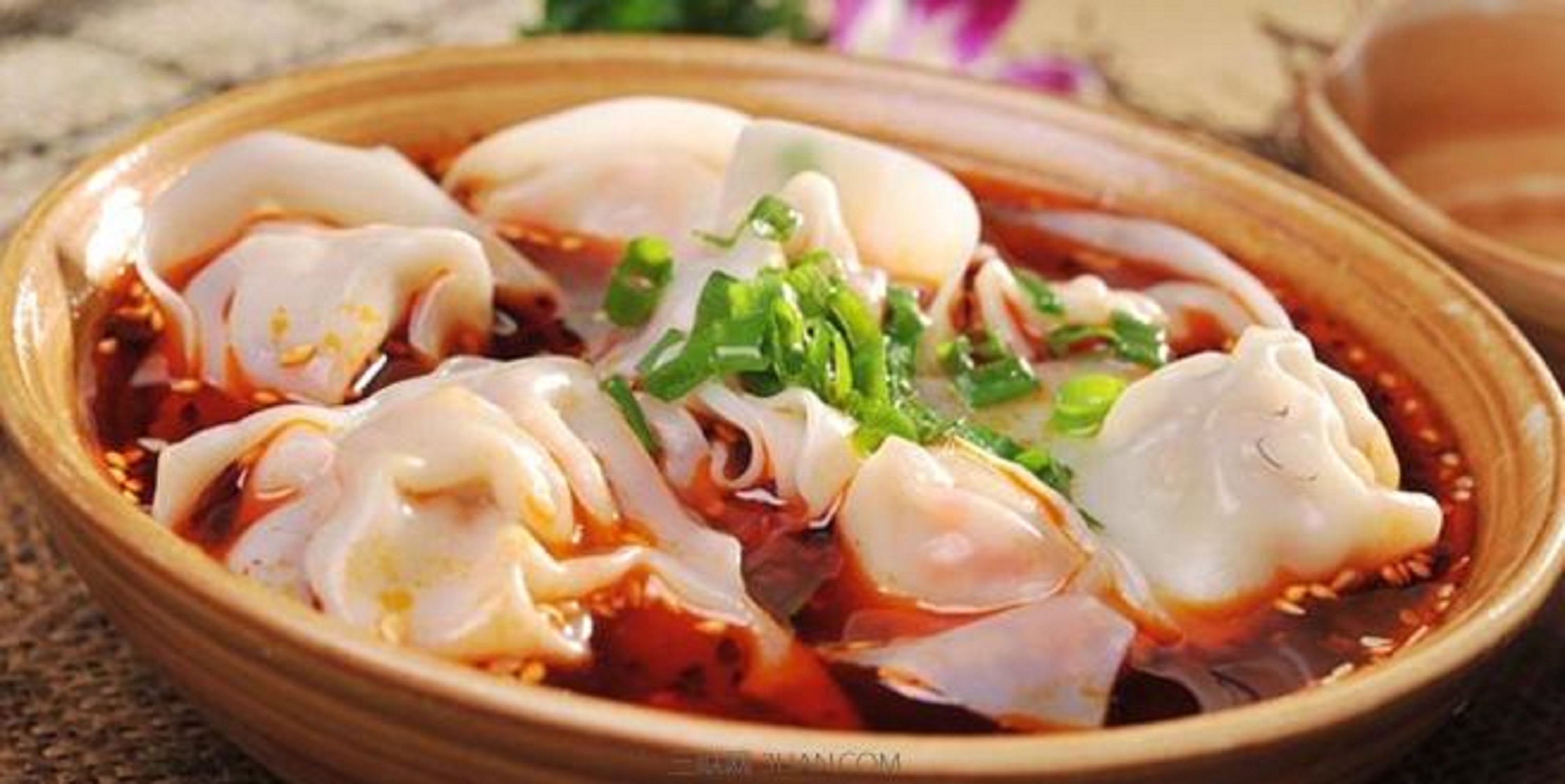meat dumplings in spicy sauce