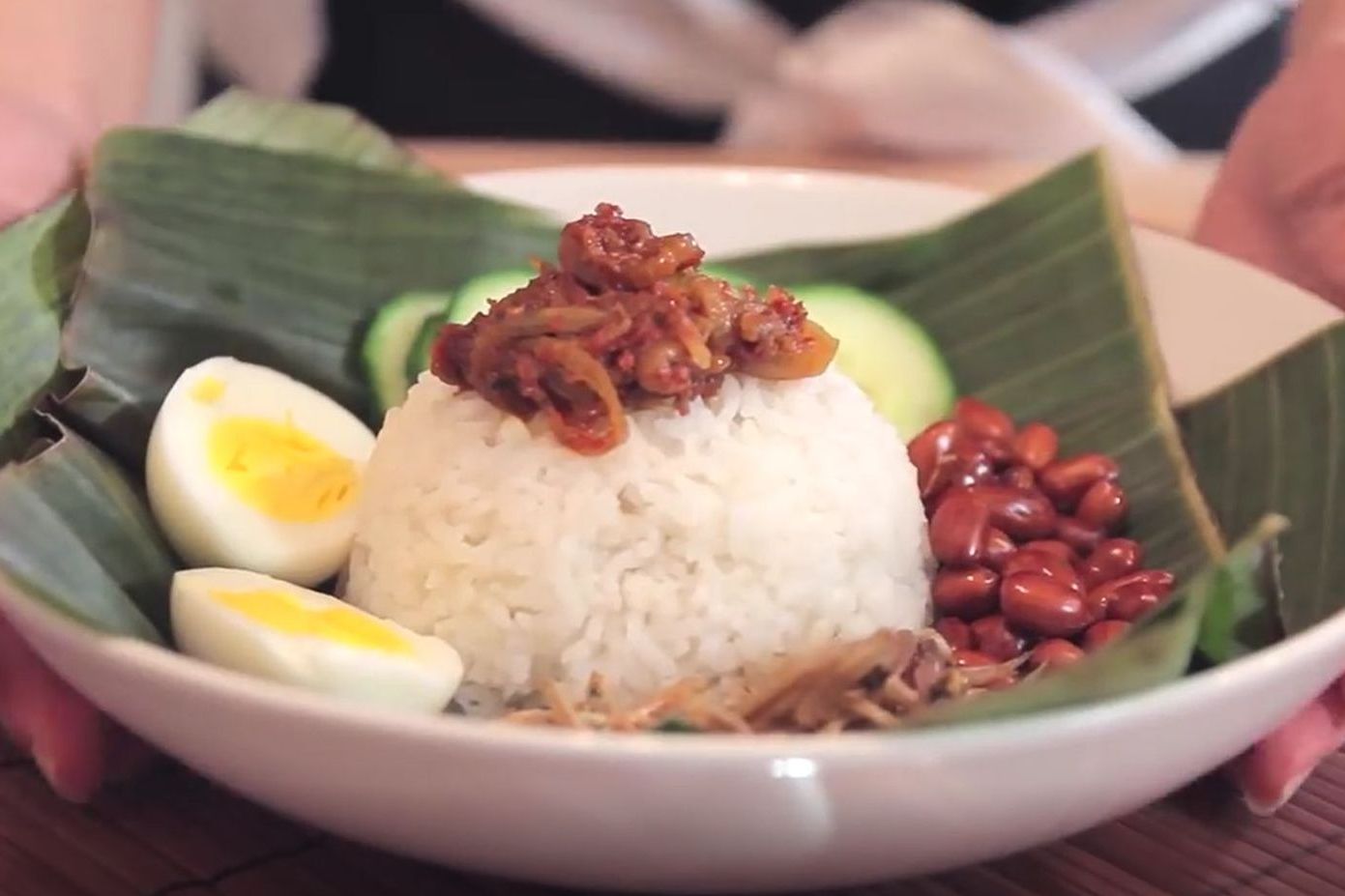 p>椰浆饭(nasi lemak)是在 a href="#" data-lemmaid="212618">文莱 