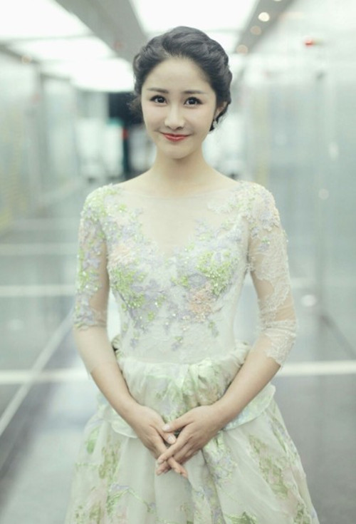 梁田（中国内地女主持人、演员）_百度百科