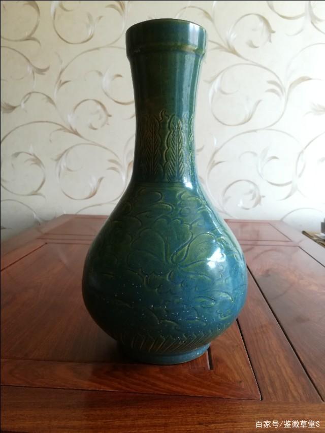 您没注意到大漏！宋代吉州窑孔雀绿釉婴戏牡丹纹直口胆瓶鉴定要点_百科TA说