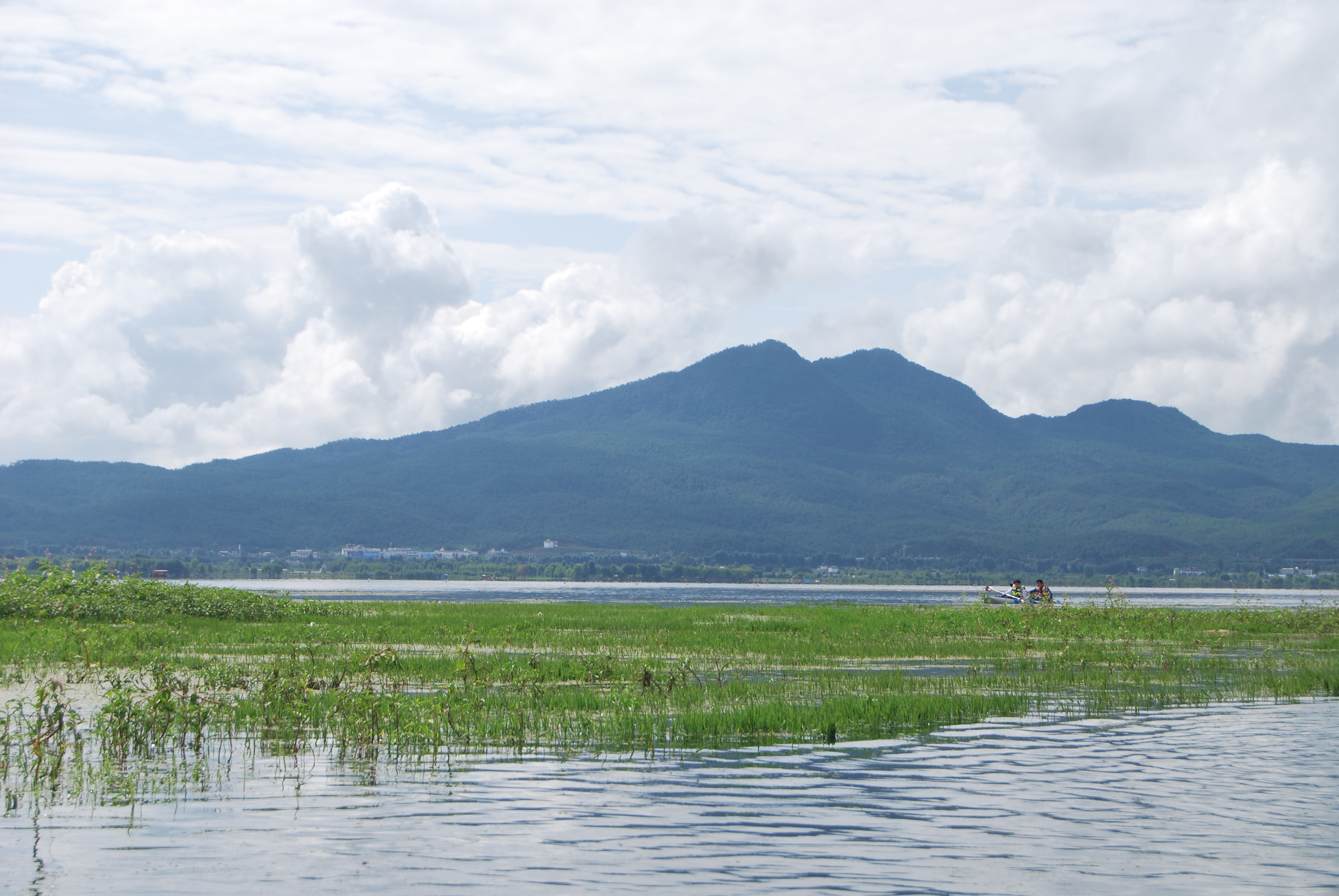  p data-id="gnwymawau7">拉市海位于丽江城西面10公里处的 a target=
