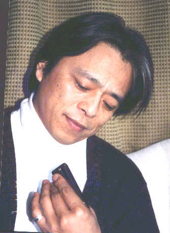  p data-id="gnwq2bq4g8">杨乐,1956年出生,中国口琴第一人,以 a