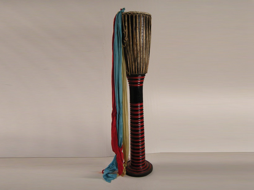 是云南傣,景颇,阿昌,布朗,拉祜等族的一种打击乐器. /p>