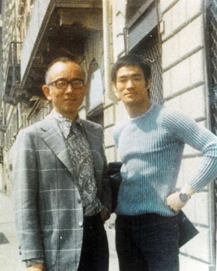 target="_blank" href="/item/邹文怀/5751440" data-lemmaid="