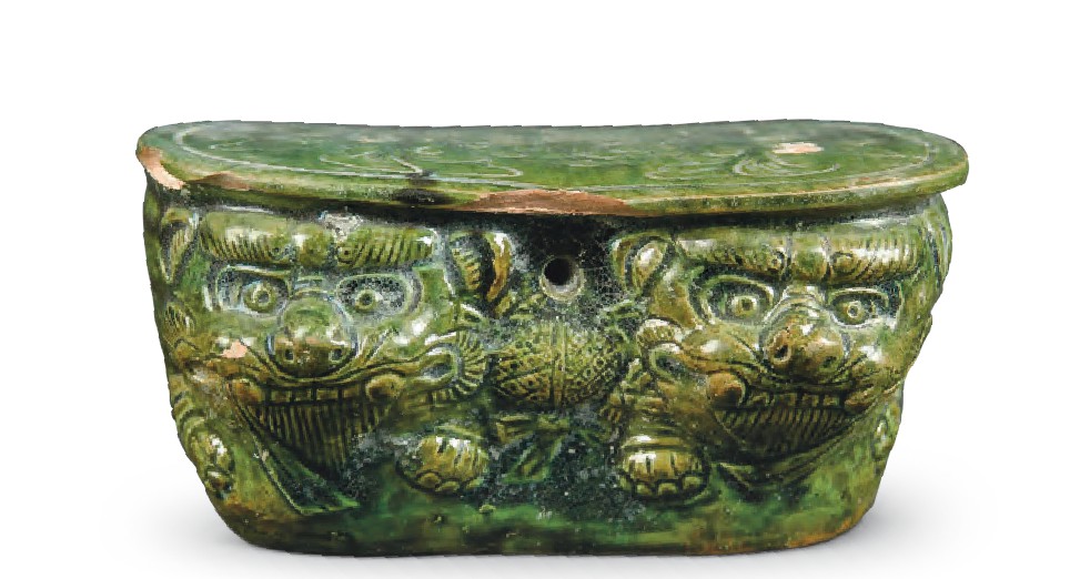 w9yye">绿釉双狮瓷枕,<a target="