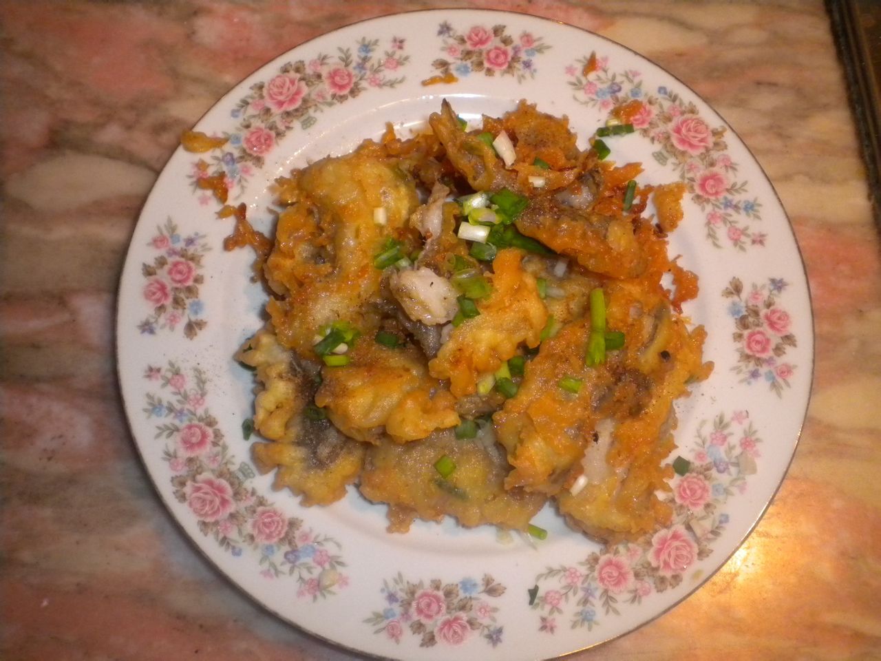  p data-id="t9ghctb5olvs">金黄嫩脆龙头烤以九肚鱼为主料的菜品.