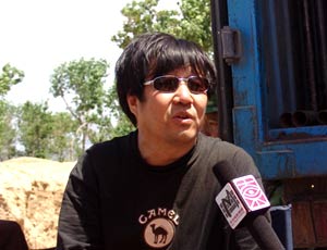 又一年》的著名导演 a target="_blank" href="/item/安战军/4335645"