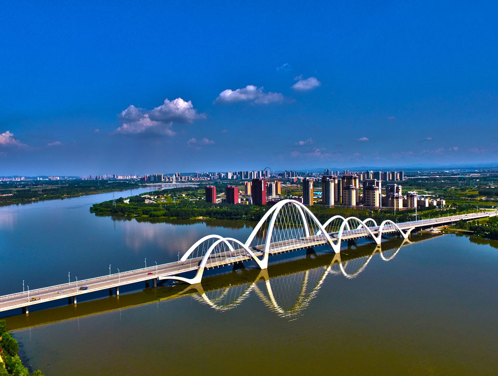  p>沈阳浑河伯官大桥,中国首座六跨中承式飘带形提篮拱桥,位于 a