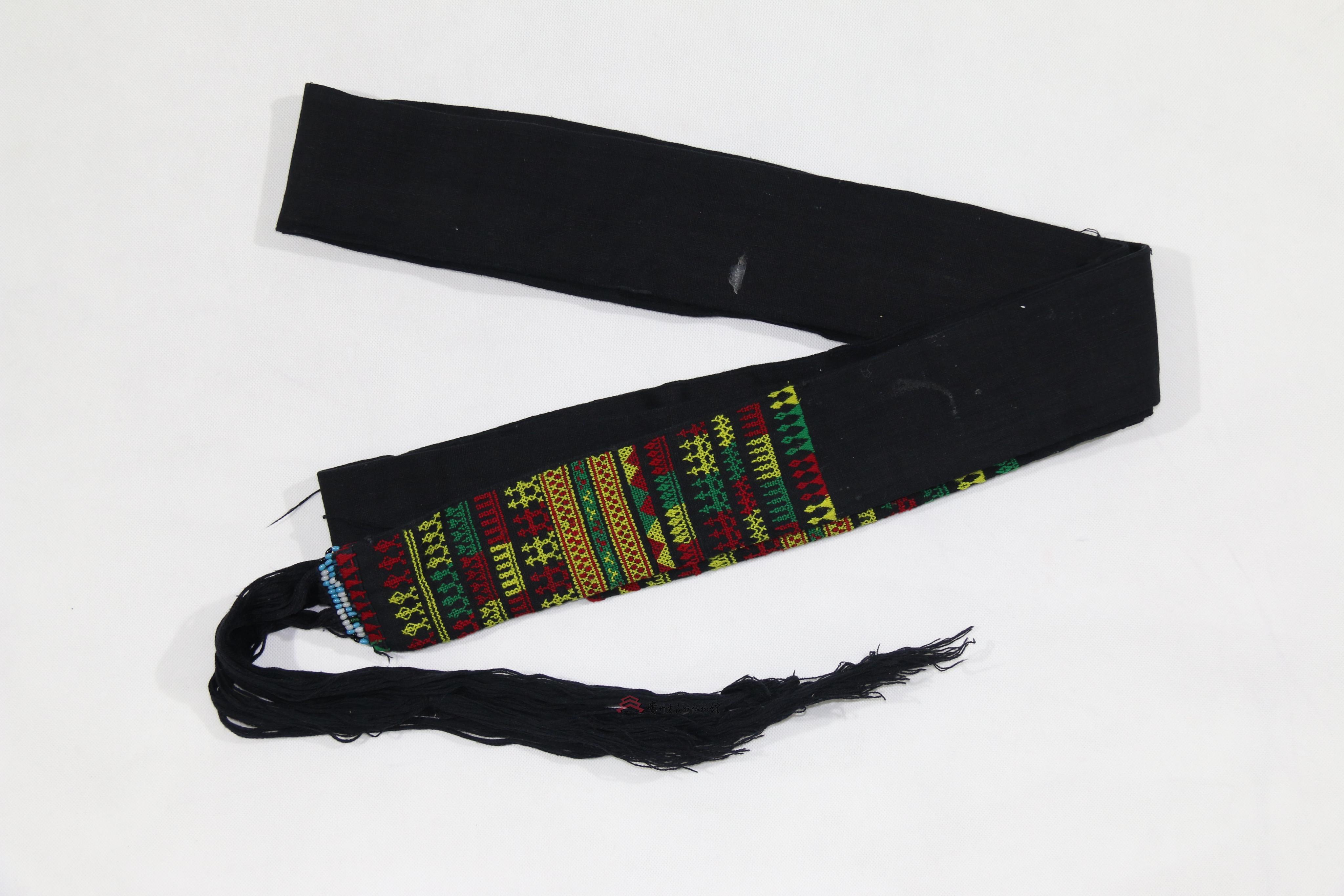 当代平塘苗族青布挑花人纹流苏腰带