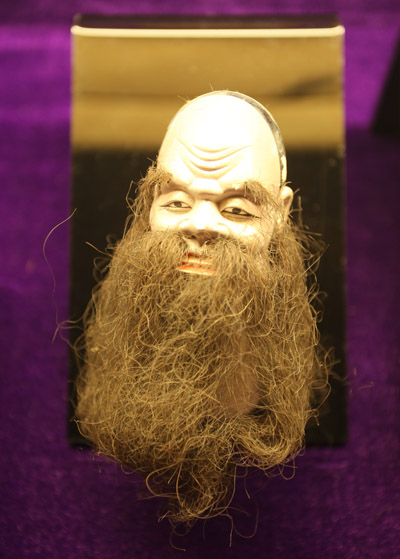 民国江加走木偶头