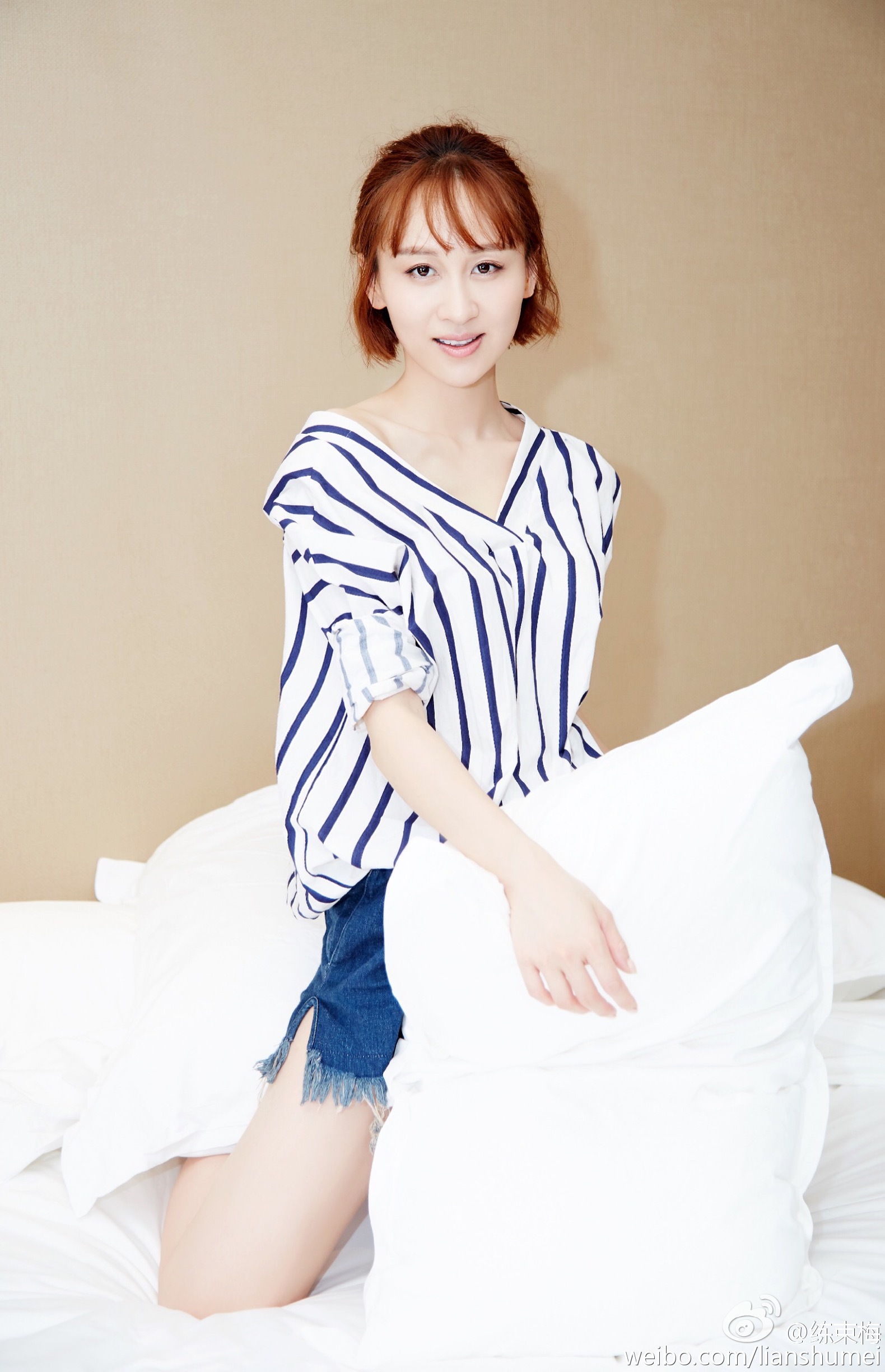 练束梅