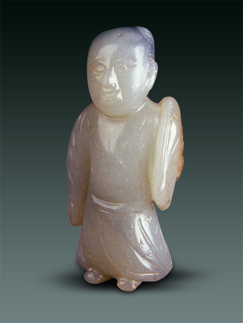  p>此展品为宋代的玉器,玉色白中泛青,圆雕,发盘双髻巧作呈黑色,身着