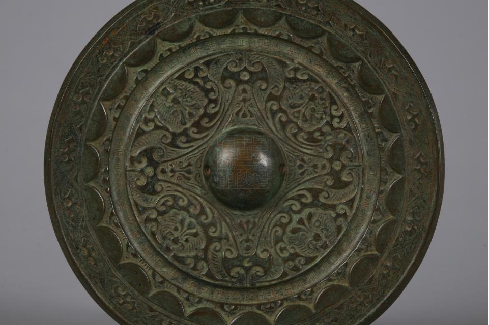 东汉熹平三年兽面铭文铜镜