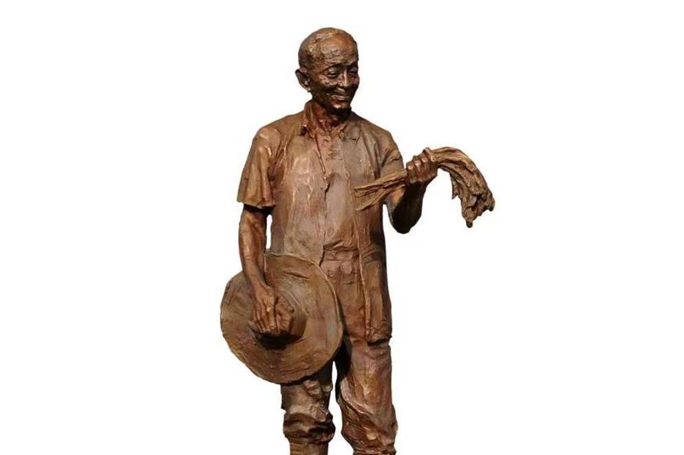  p>《袁隆平》是吴为山2010年创作的雕塑. /p>