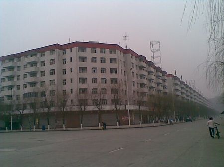 镇俗称"柳树沱",位于<a target="
