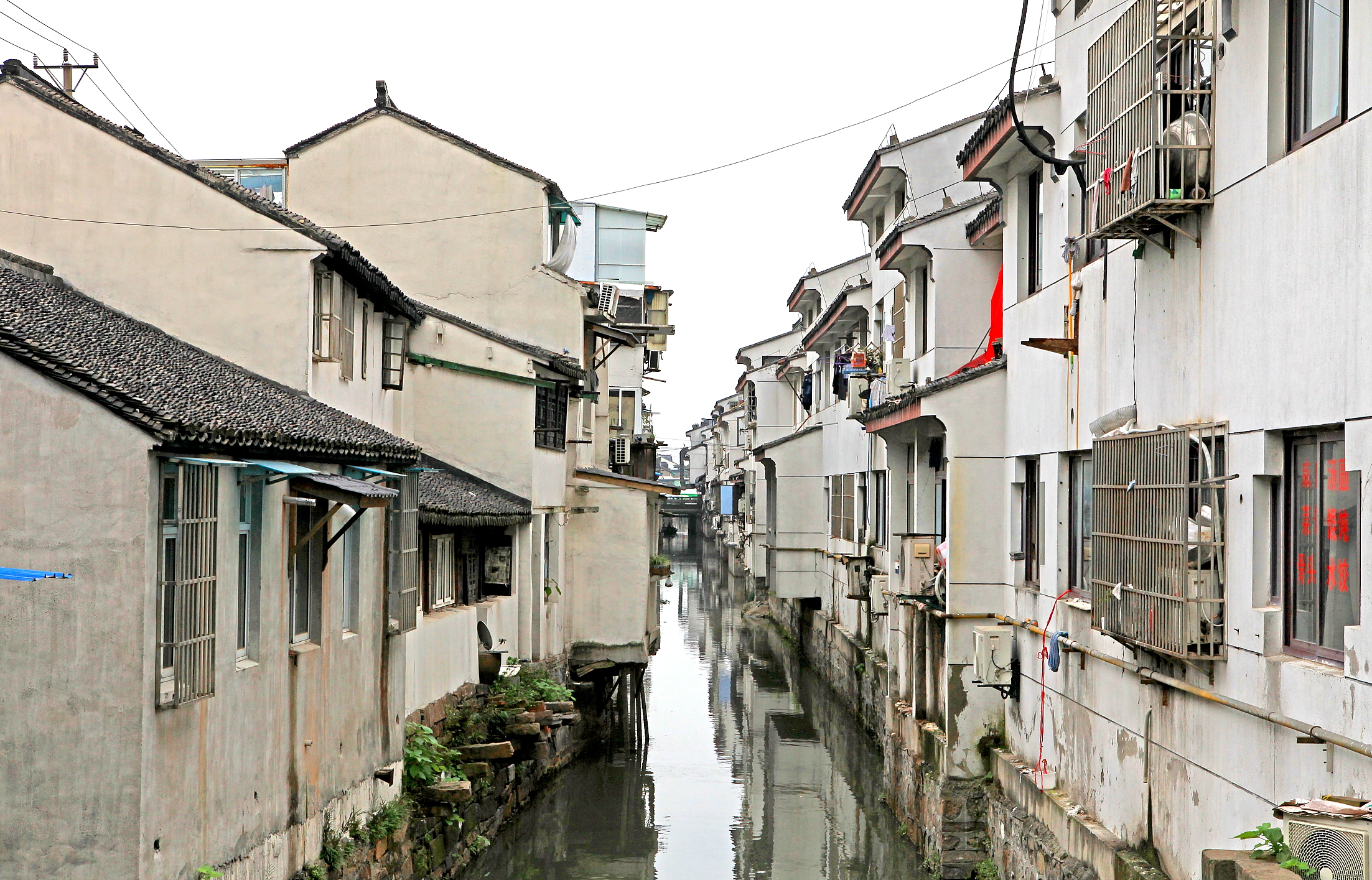  p>苏州敦化桥,俗名蹲虎桥,位于王洗马巷西口,清光绪三十一年(1905)里