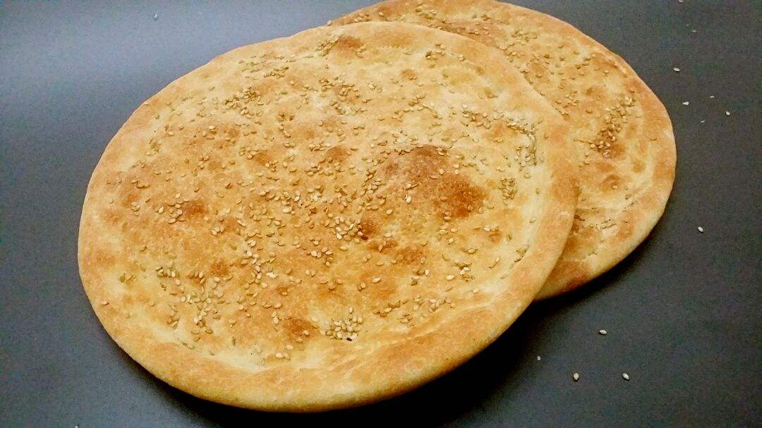 新疆烤馕和内地烧饼的“亲属关系”_百科TA说