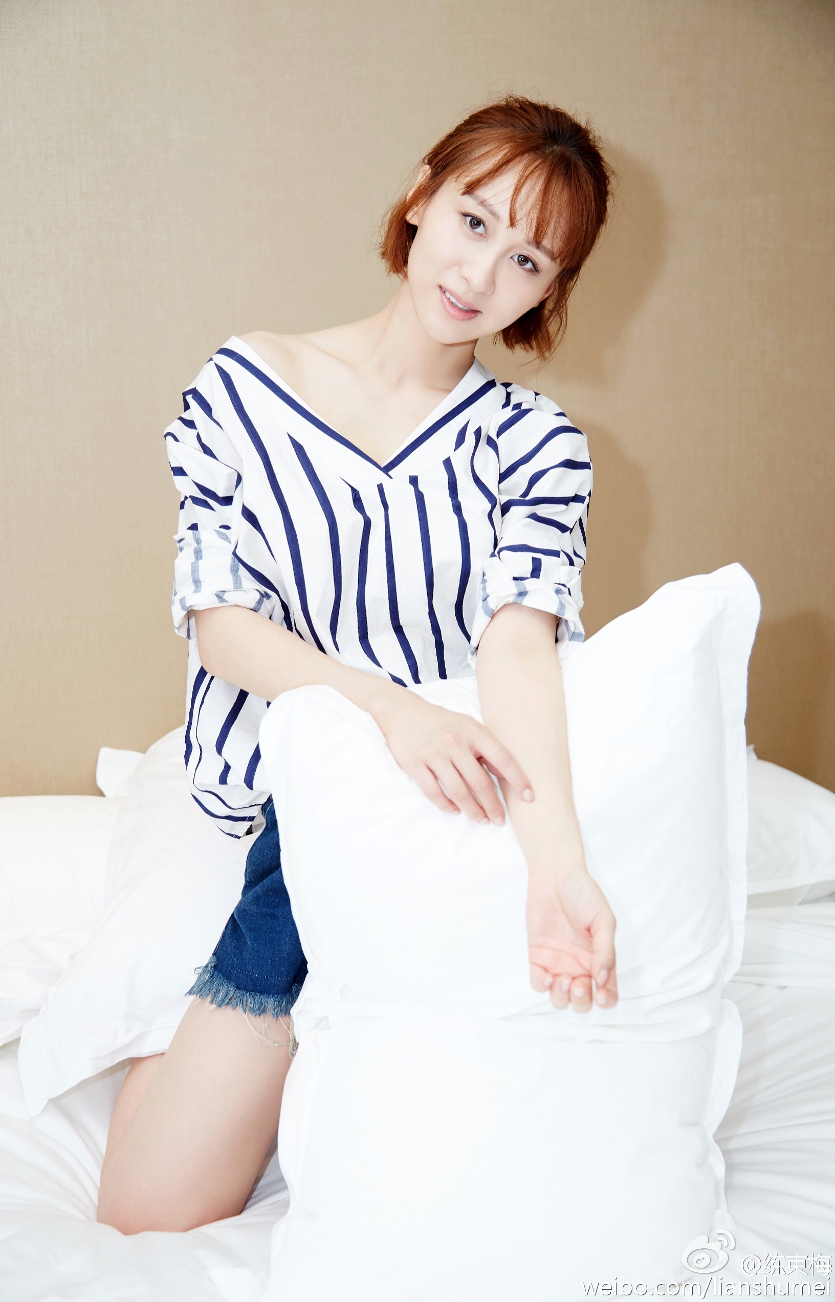 练束梅