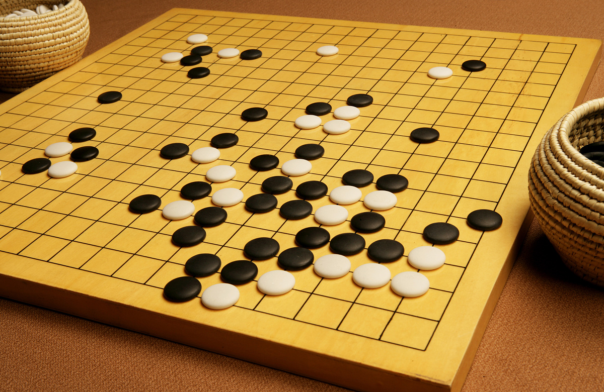  p>古代对围棋段位的称号,相当于现代的五段 /p>