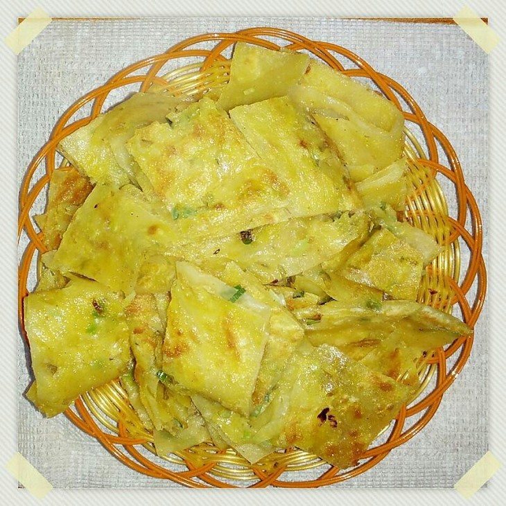  p>葱花烙饼是山西省传统特色小吃,宁武市城乡人民喜爱吃的主食之一