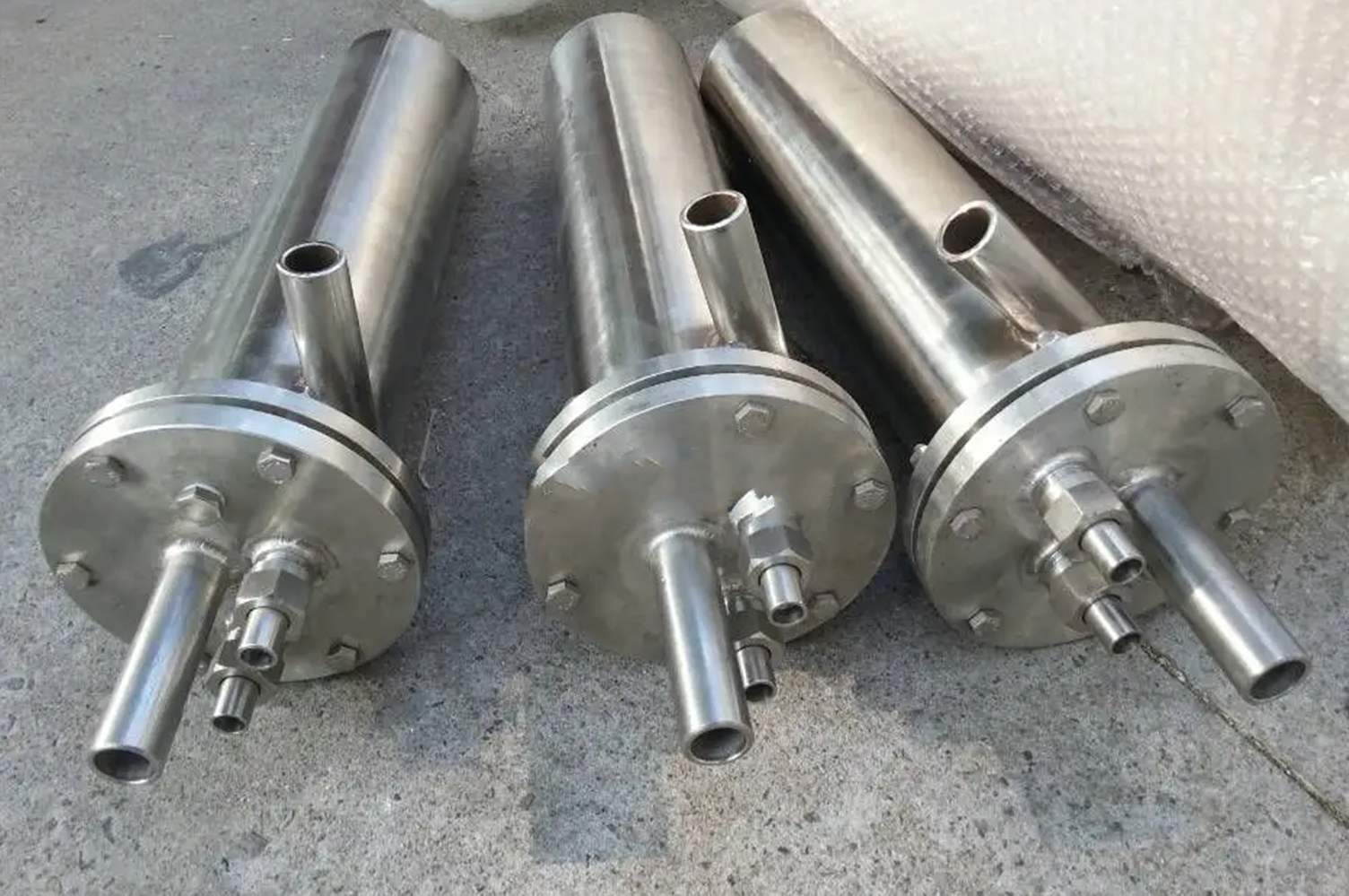 tube cooler ) 涡流冷却器又称涡旋管,涡流冷却管,涡流管(vortex tube