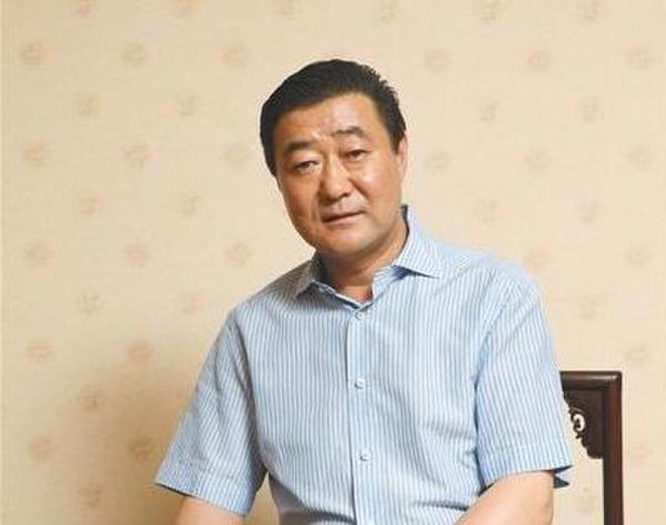 山西首富张新明