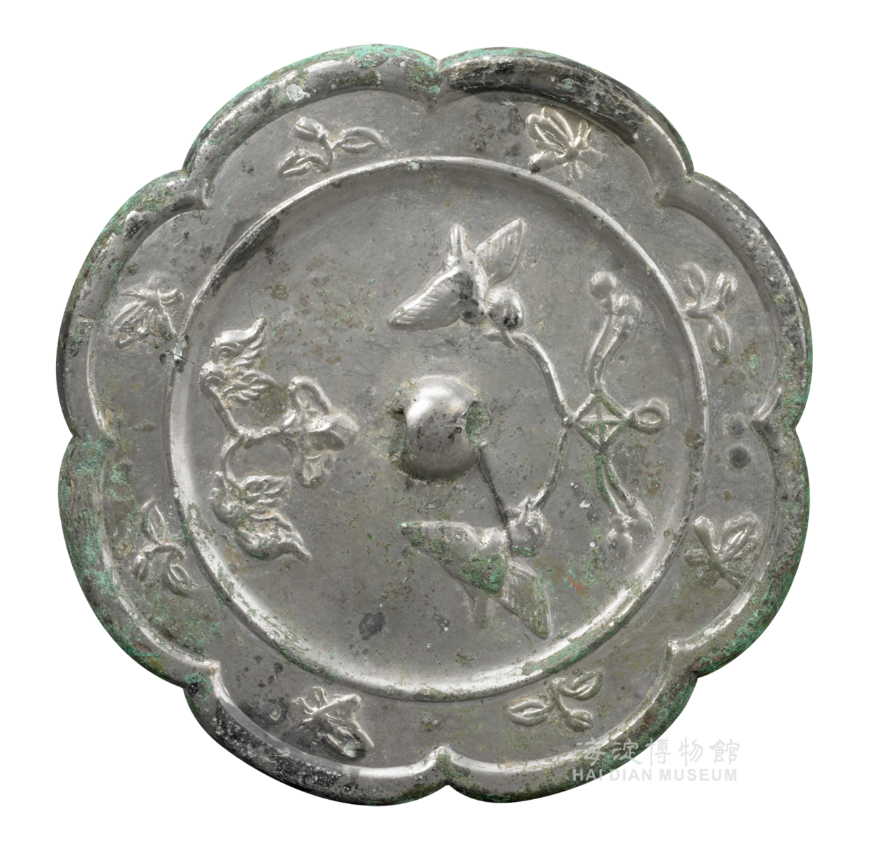 唐花鸟纹菱花形铜镜