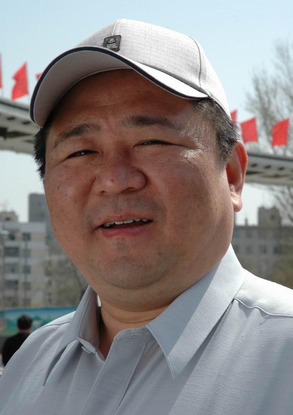 梁冠华