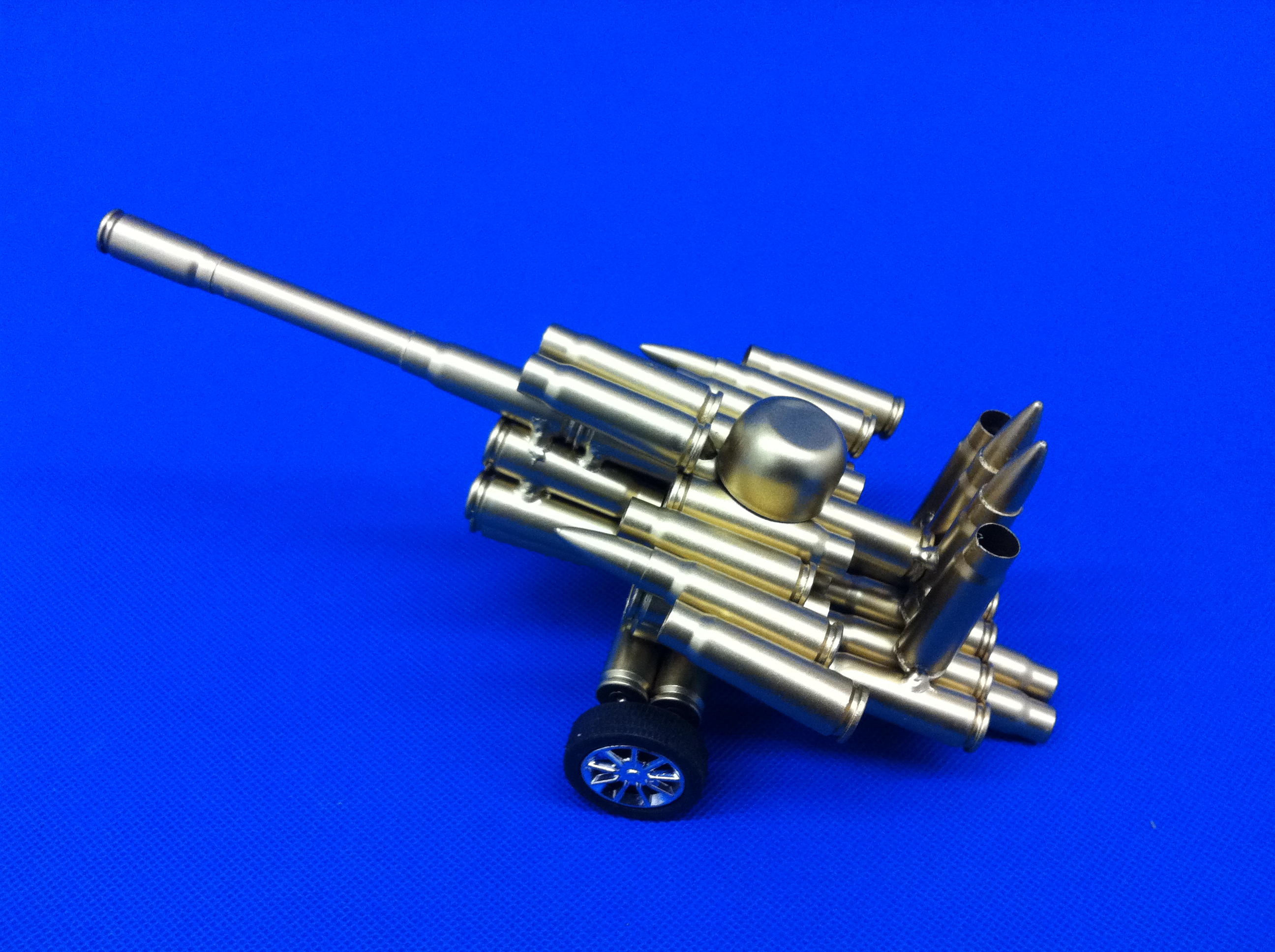  p>弹壳工艺品,又称子弹壳工艺品,弹壳模型.