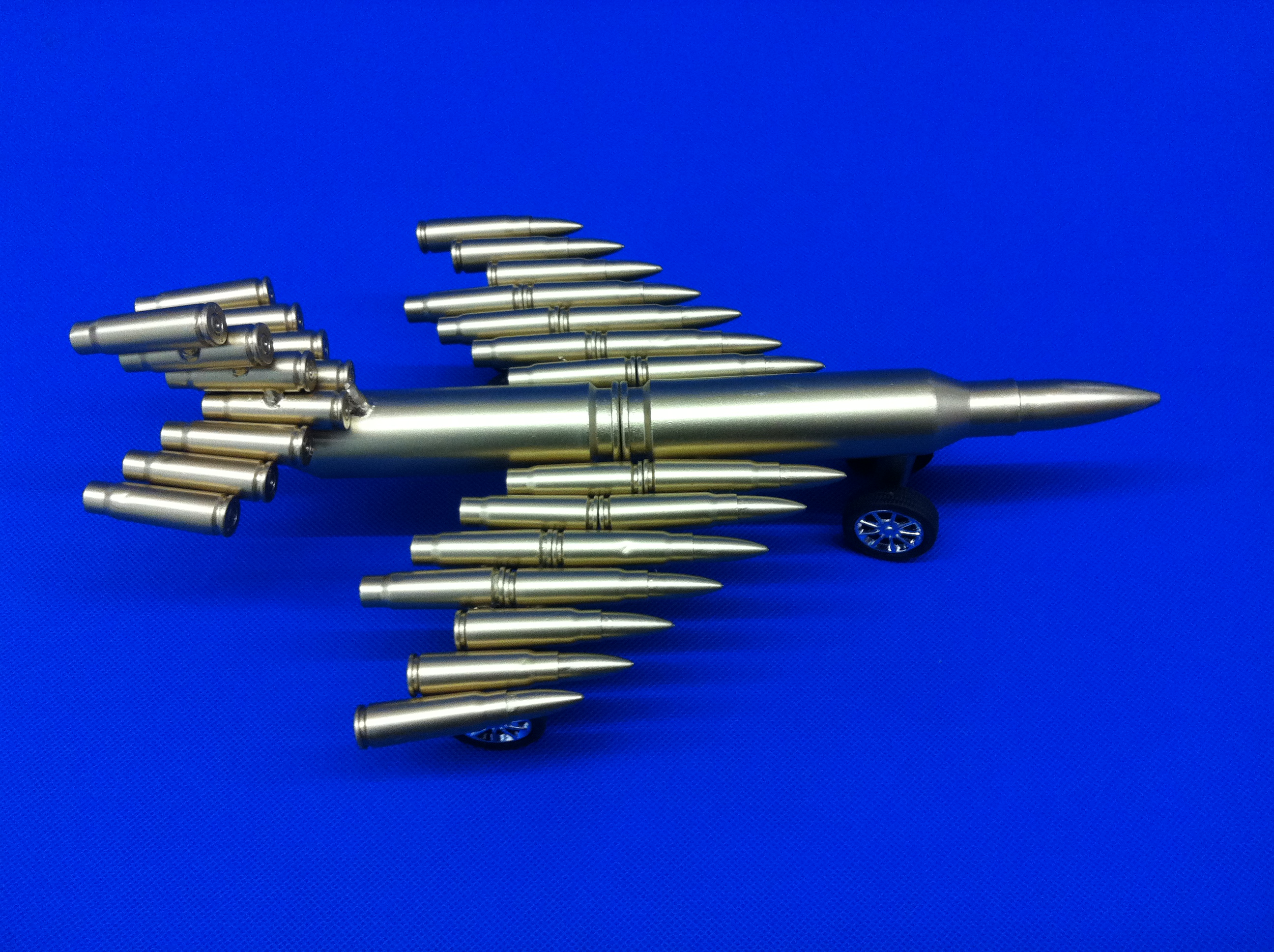  p>弹壳工艺品,又称子弹壳工艺品,弹壳模型.