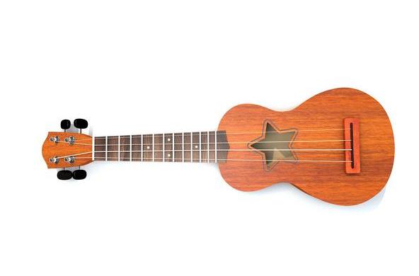  p>传统的夏威夷吉他外形类似于 a href="#" data-lemmaid="285338">