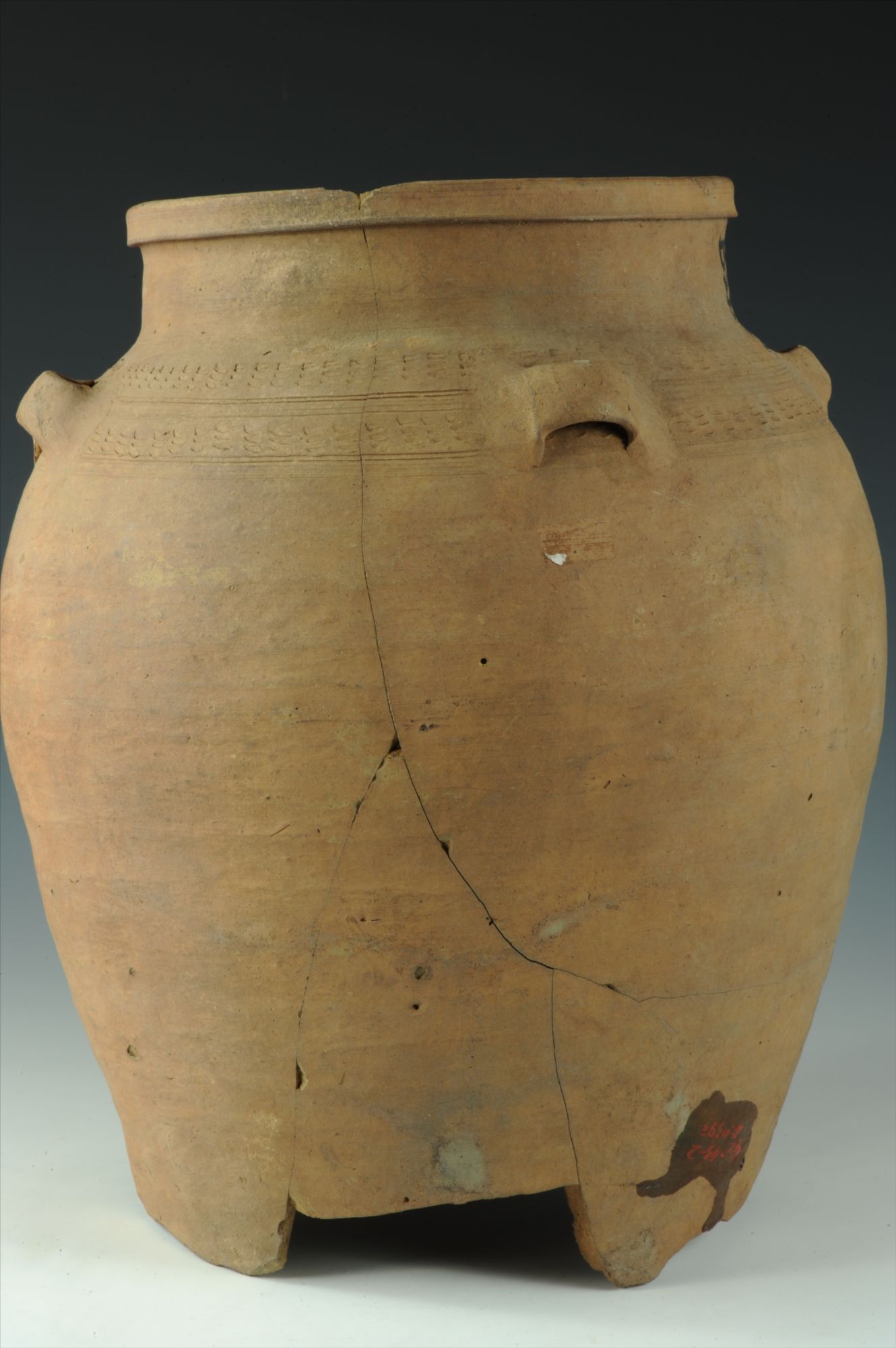 汉代戳印纹四系红陶罐