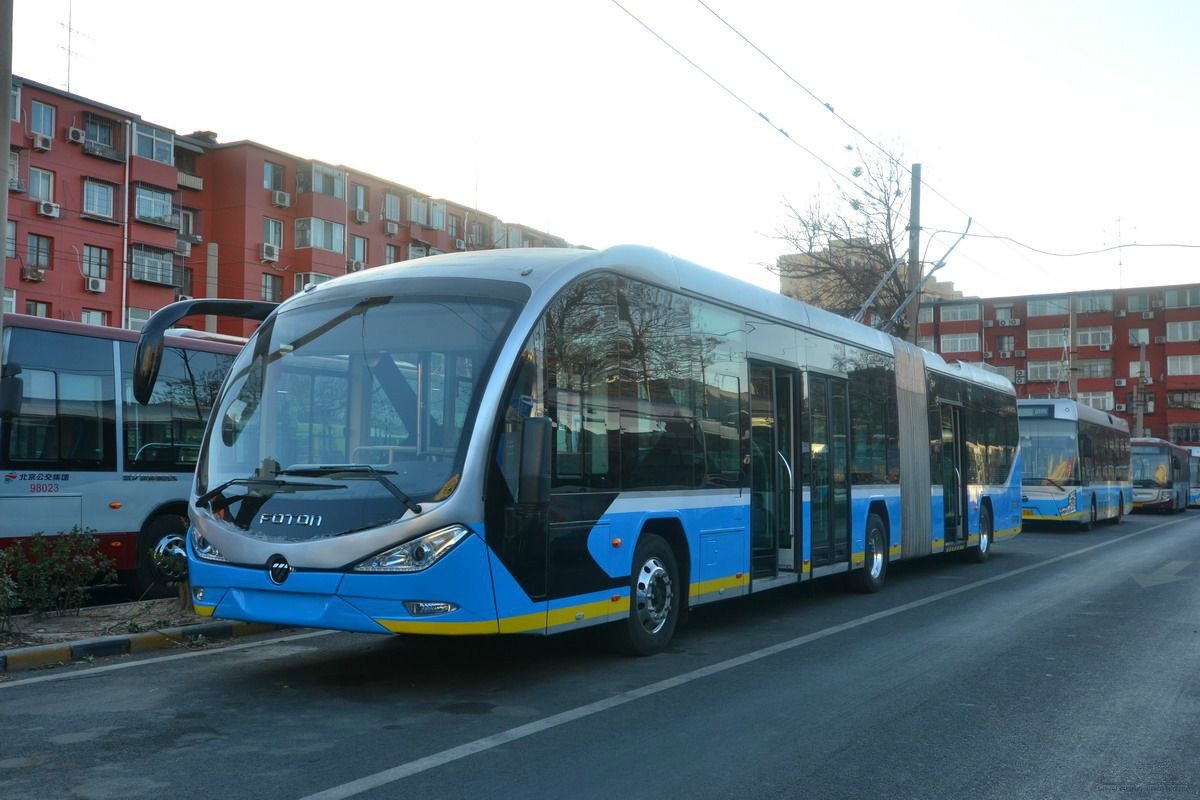  p>无轨电车(trolleybus)是一种通常由架空接触网供电,电动机驱动,不