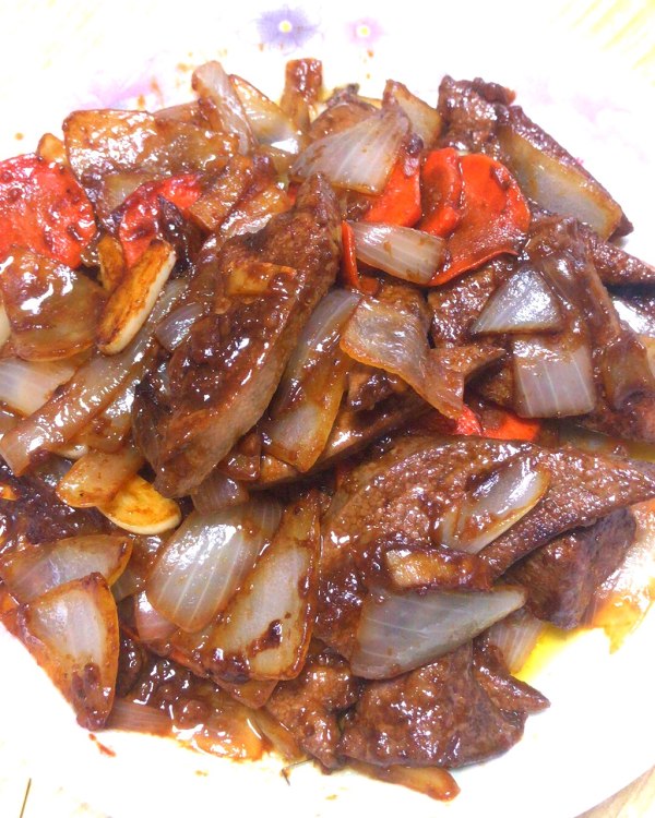  p>炸溜肝尖是一道美食,原料是猪肝,青椒,木耳等. /p>