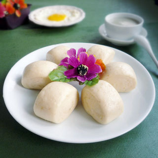  p>奶香茯苓馒头是一道美味的面点,主料有 a target="_blank" href="