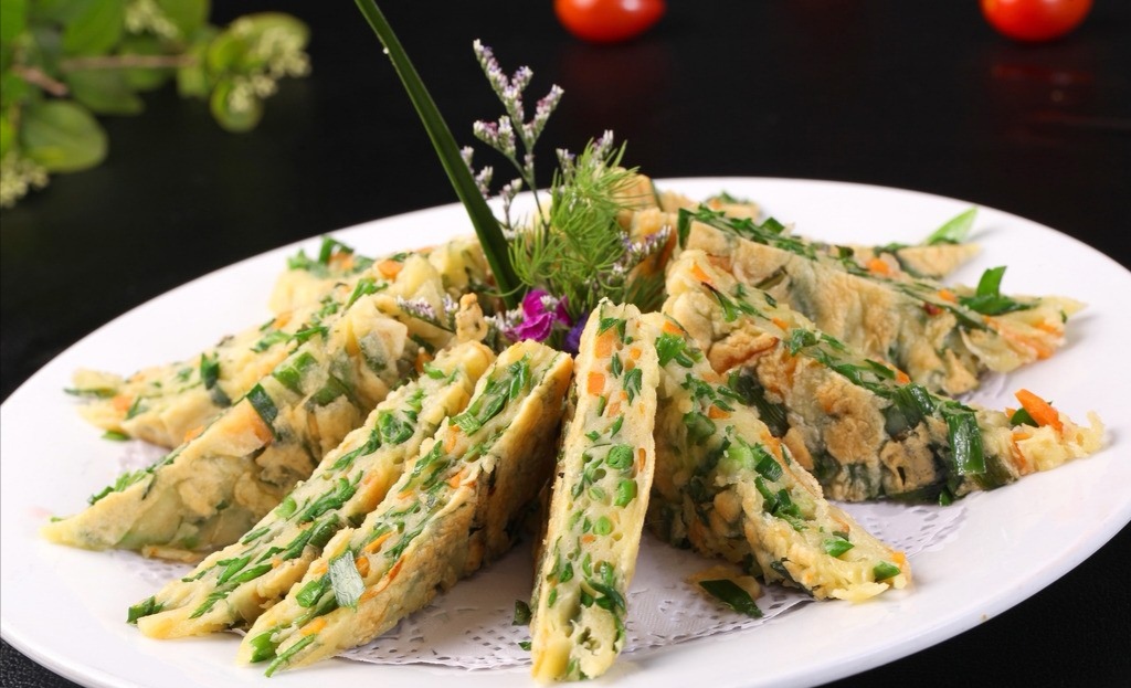  p data-id="go0kr4zbmr">香煎槐花饼是一道美食,制作材料有槐花,干