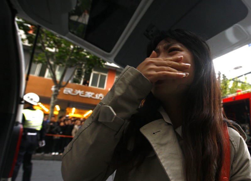  p>2010年11月15日14时,上海余姚路胶州路一栋高层公寓起火.