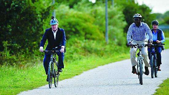  On July 28, British Prime Minister Boris Johnson (left) rode in Biston