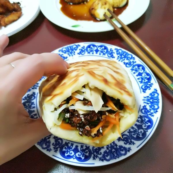  p data-id="gnwilisi3d">菜焙子,一名"焙子夹菜",张家口市怀来县的