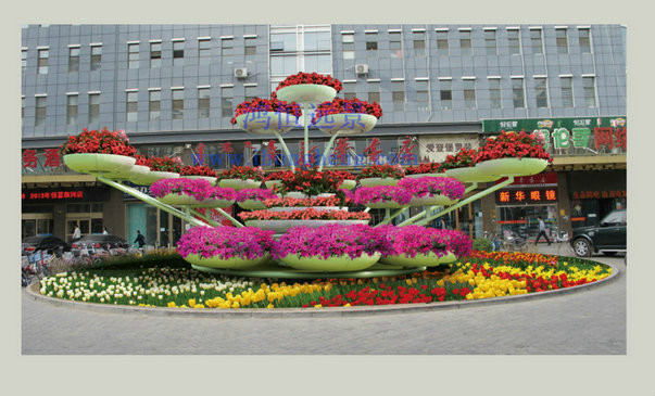  p data-id="gnzrfylaji">花坛是在植床内对 a target="_blank" href=