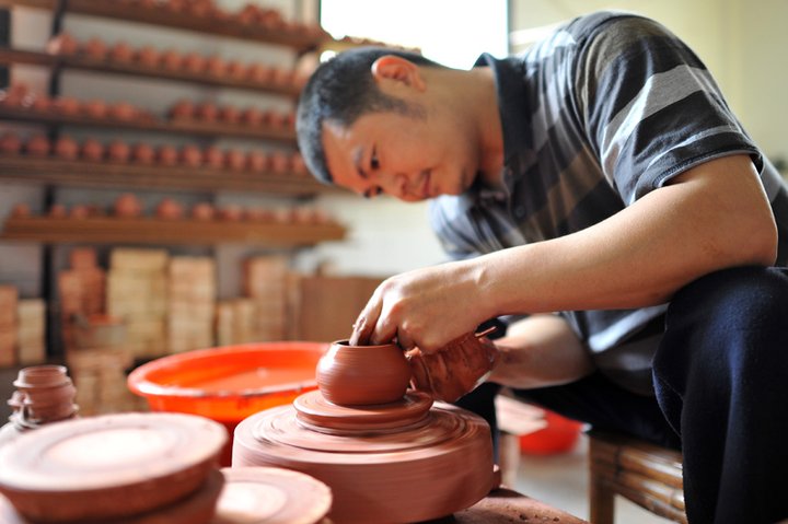 枫溪手拉朱泥壶制作技艺