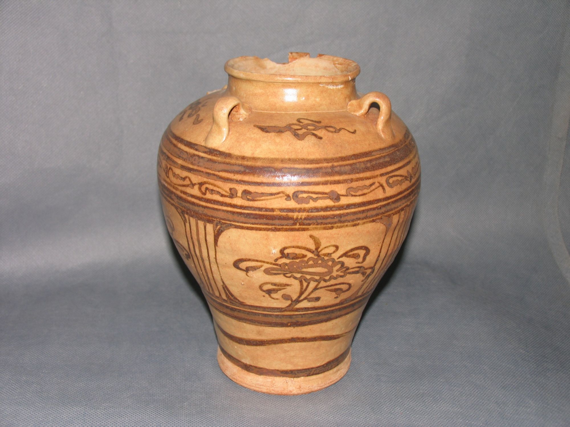 明代青釉褐彩花卉纹四系瓷罐