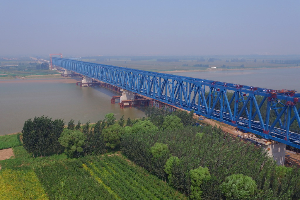  p>黄韩侯铁路新黄河特大桥所处的黄河禹门口段作为晋陕两省交界的