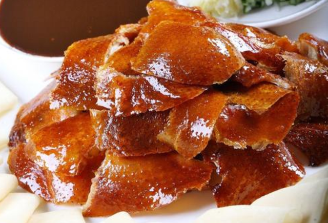  p>郑州烤鸭是一家主打名菜"郑州烤鸭",同时提供各种著名小吃的美食店