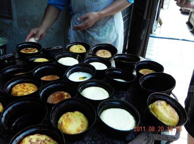  p data-id="gnasdxix6v">熨斗粑是四川省会理县的名小吃.