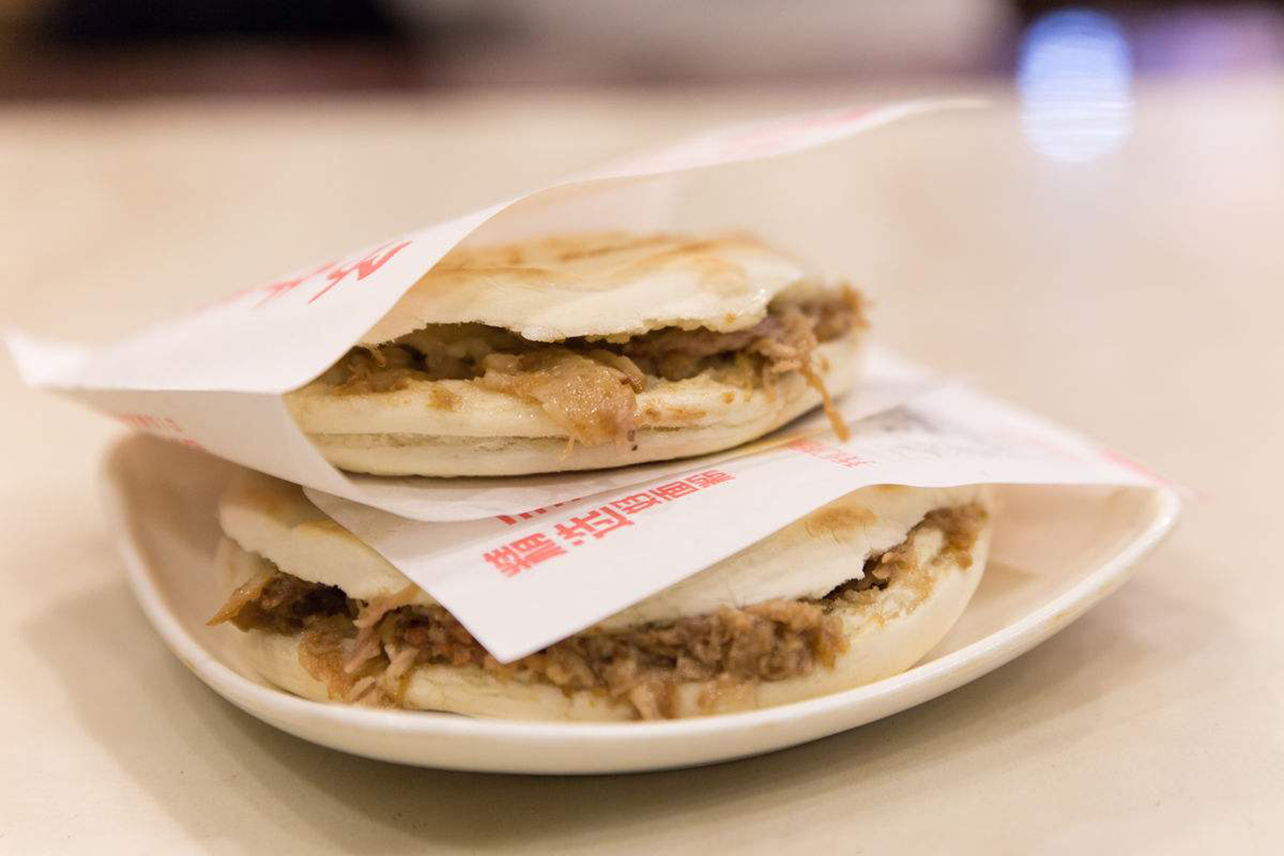 传统的陕西腊汁肉夹馍的制作方法包括 a href="#" data-lemmaid="